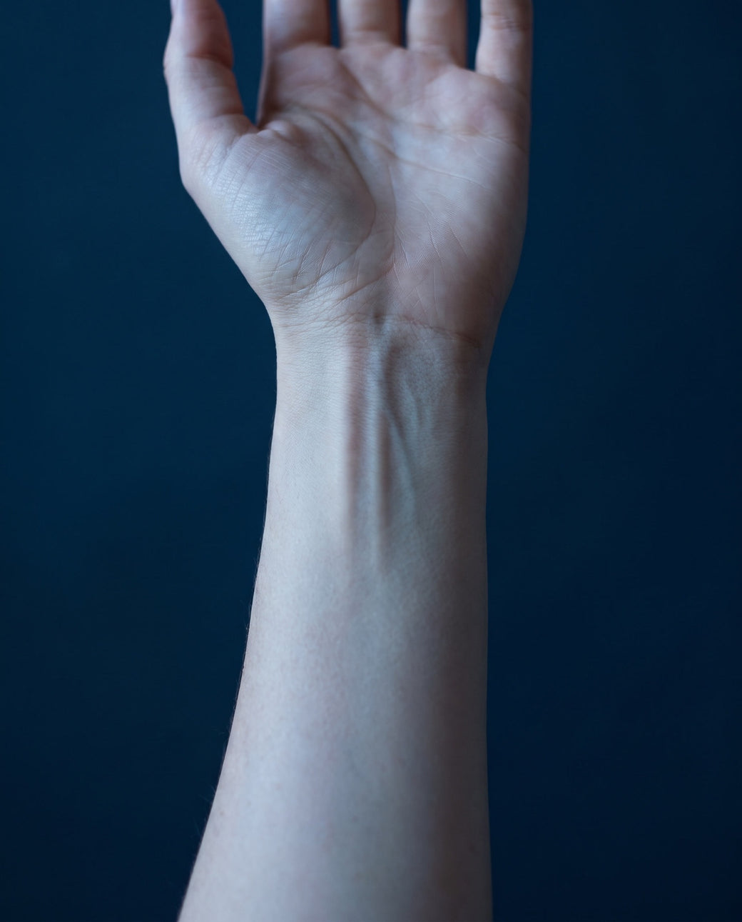 Inner wrist, palm up, with the P6 point marked